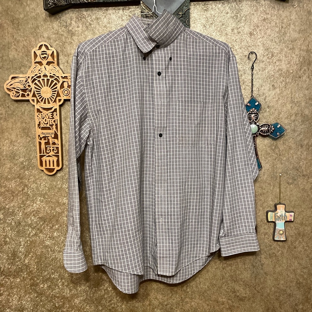 Black and white, long sleeve, button down shirt.